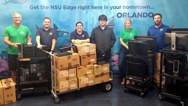 Technology team giving it equipment donations to community