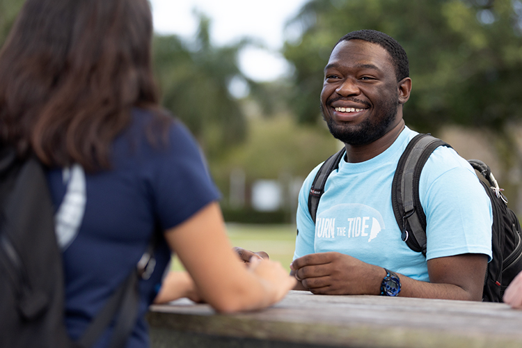 NSU students talking outdoors