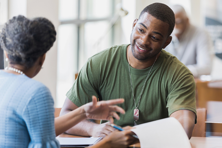 Veteran speaking to his advisor