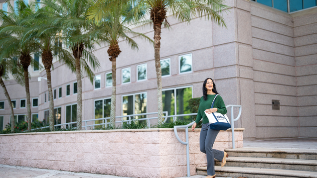 Student walking on campus.