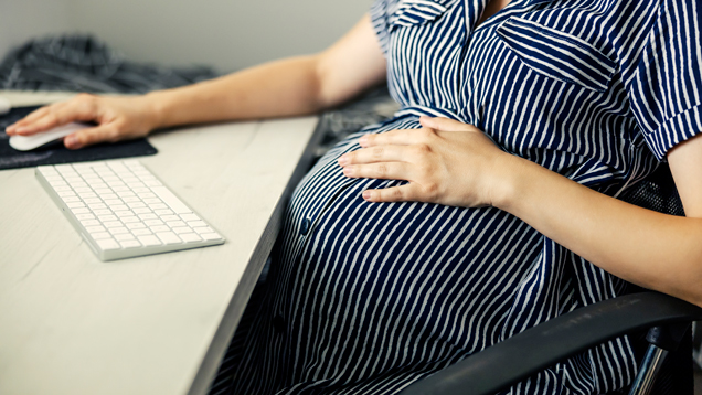 Woman during maternity connecting with health coach