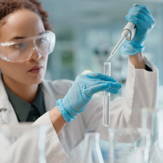 Life sciences chemist working on lab
