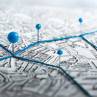 Map with pins for global logistics